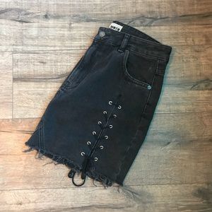 Moto denim mini skirt with front lace slits